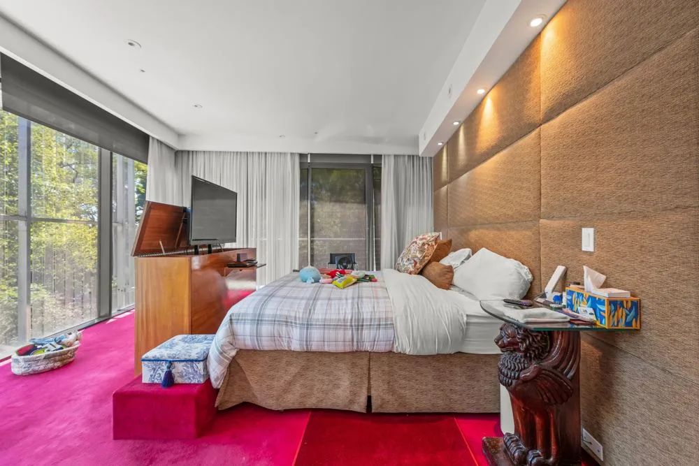 Primary bedroom at Modern architectural home